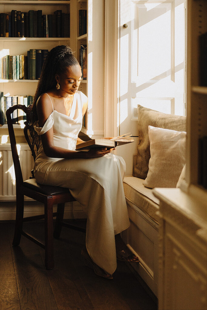 Xtine reading a book